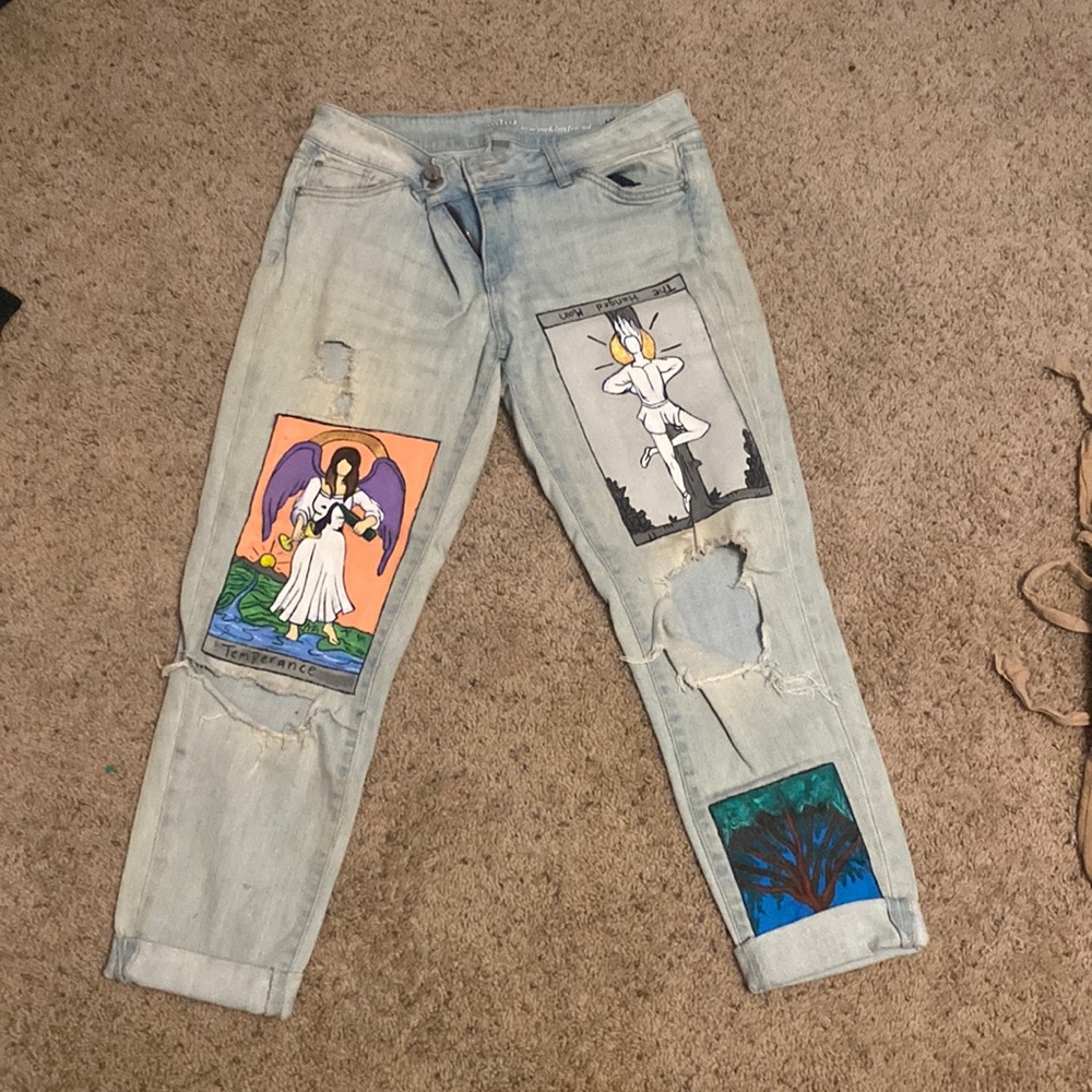 soho new york boyfriend jeans with tarot cards painted on the front